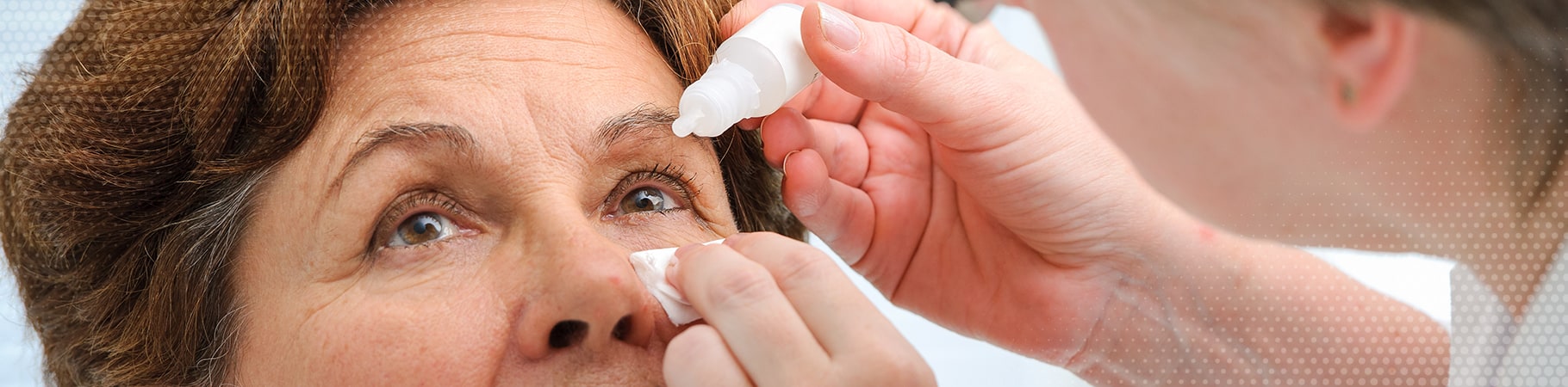 woman getting eye drops